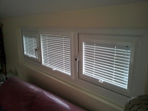 Perfect fit venetians down with louvres open.